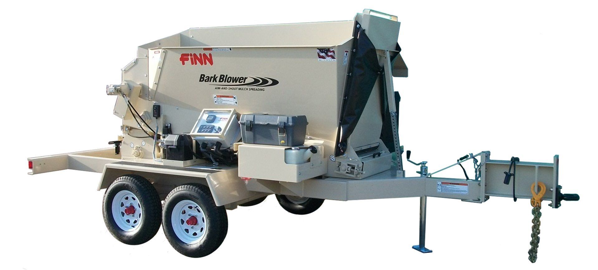 Tan mobile asphalt mixing plant with a trailer.