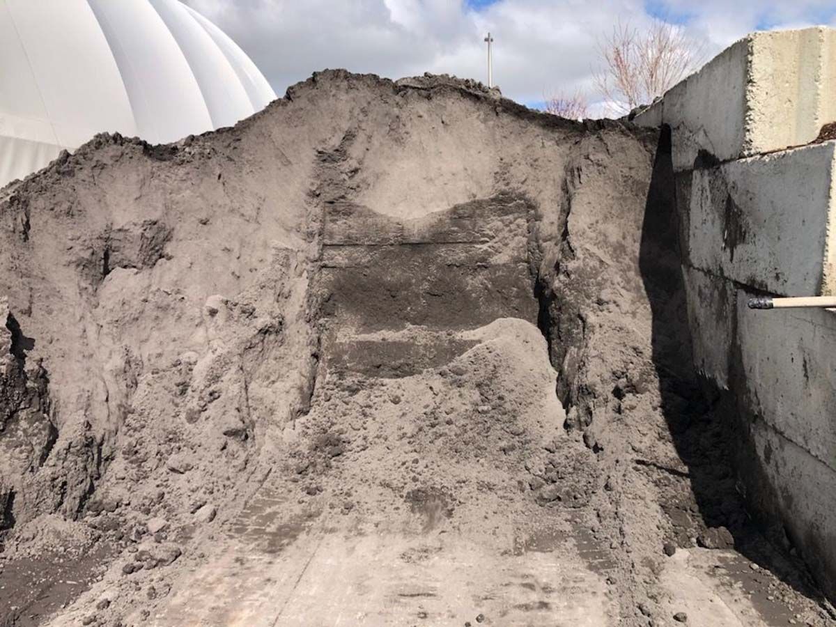 A large pile of sandy loam topsoil