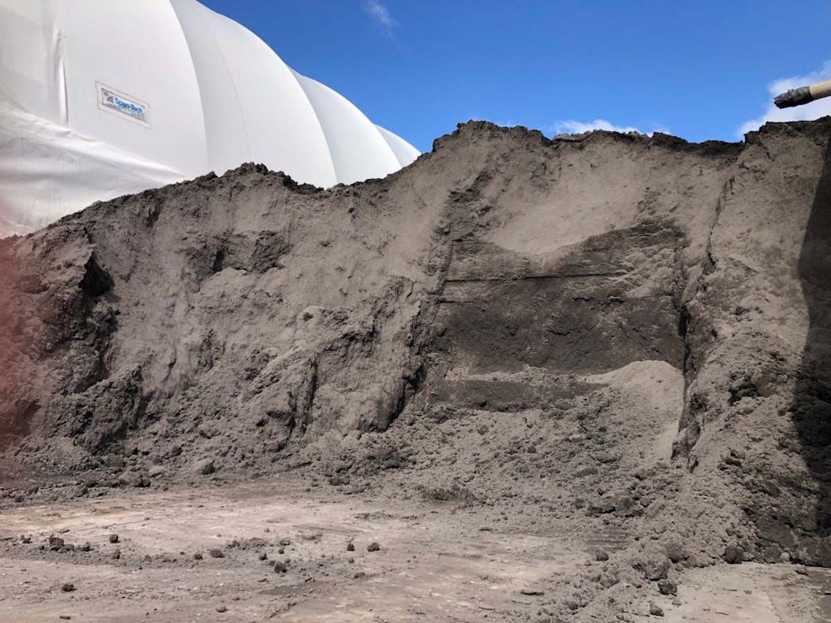 A large pile of gray dirt