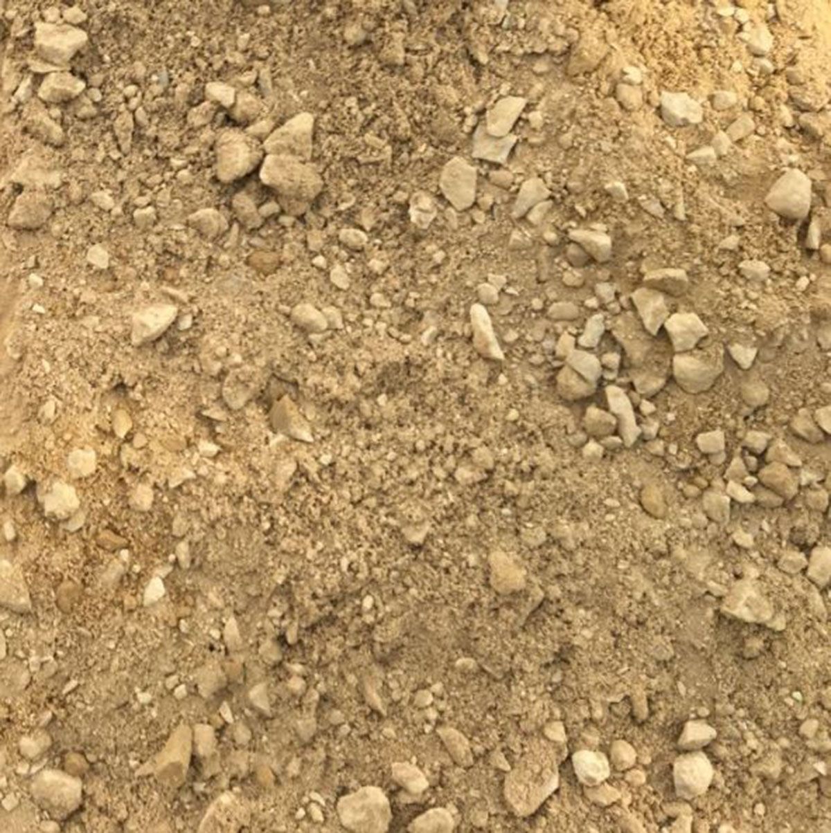 A pile of light brown class 5 gravel