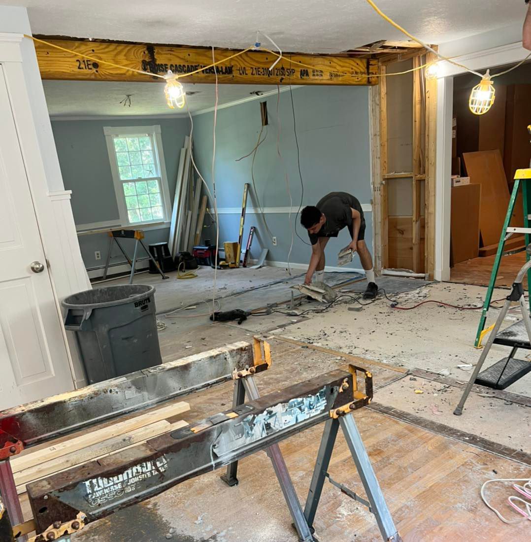 A man is in a room under construction