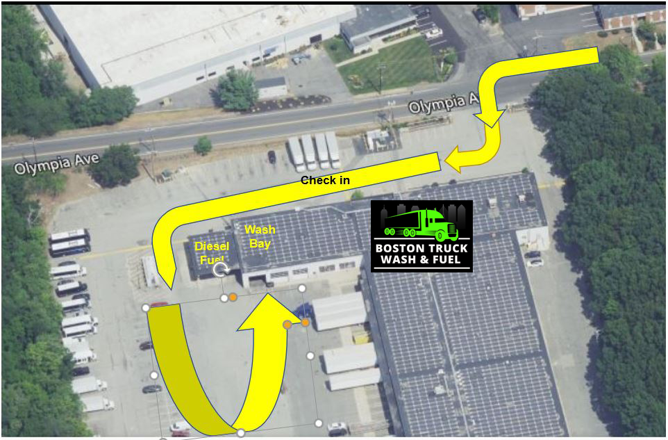 Aerial map of a parking lot with yellow route arrows showing directions to a building entrance.
