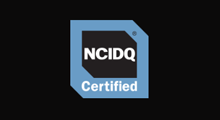 NCIDQ Certified logo: Black and blue square with 