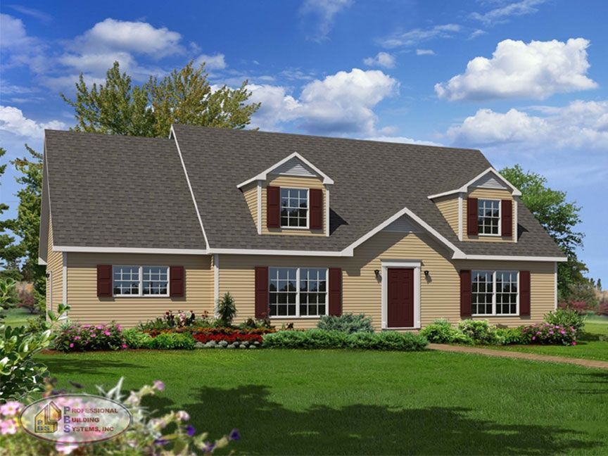 A large house with a lot of windows and shutters