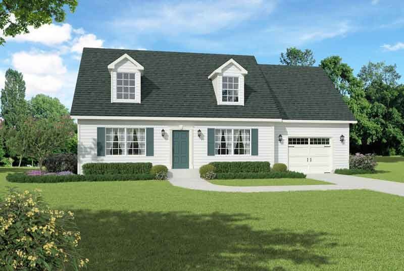 A white house with a black roof and green shutters