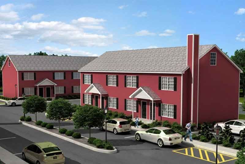 An artist 's impression of a red apartment building with cars parked in front of it.