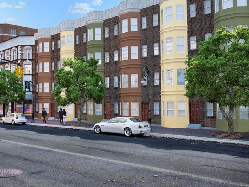 A white car is parked in front of a building