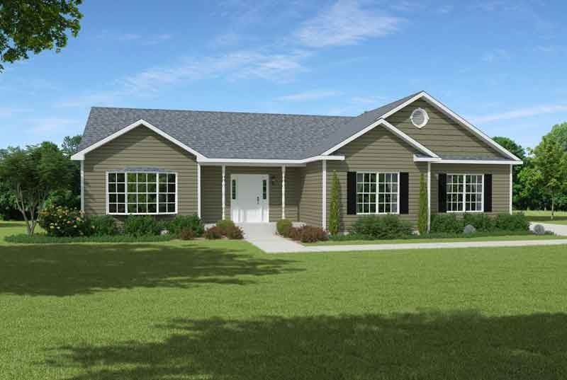 A large house with a lot of windows and shutters is sitting on top of a lush green field.