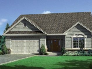 A house with a brown roof and a white garage door