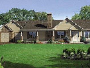 A large house with a large lawn in front of it