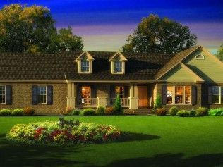 A large house with a lot of windows and shutters