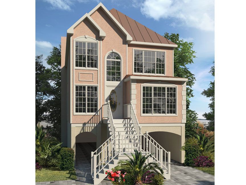 A large house with a lot of windows and stairs