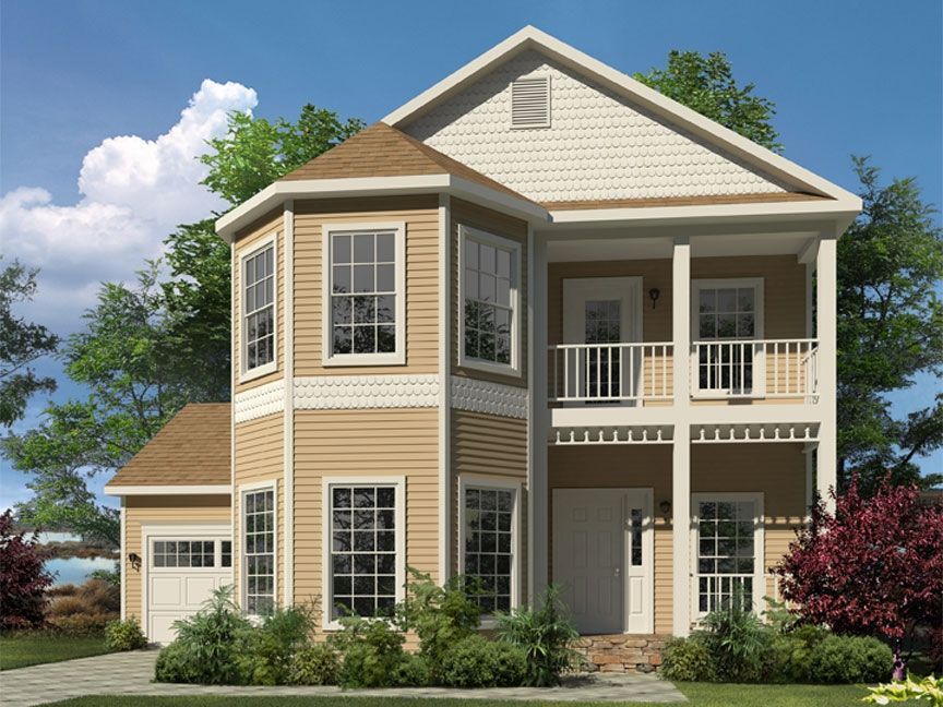 A house with a lot of windows and a porch