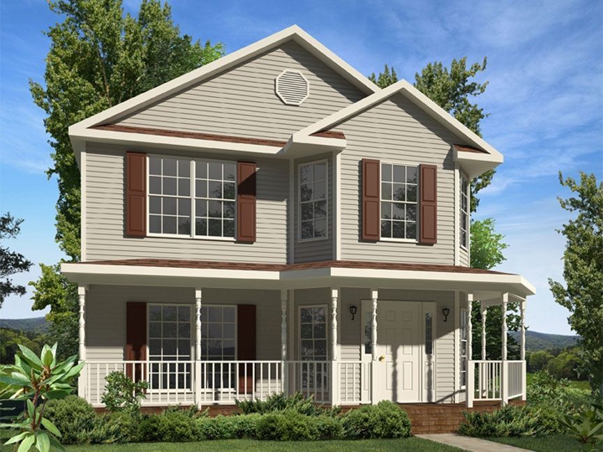 A large house with a porch and a lot of windows