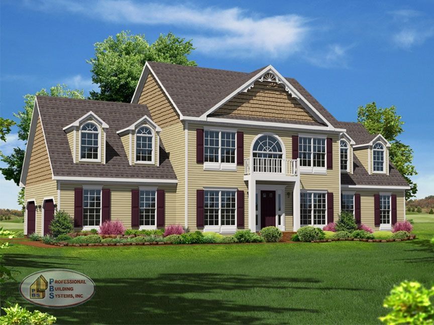 A large house with a lot of windows and shutters