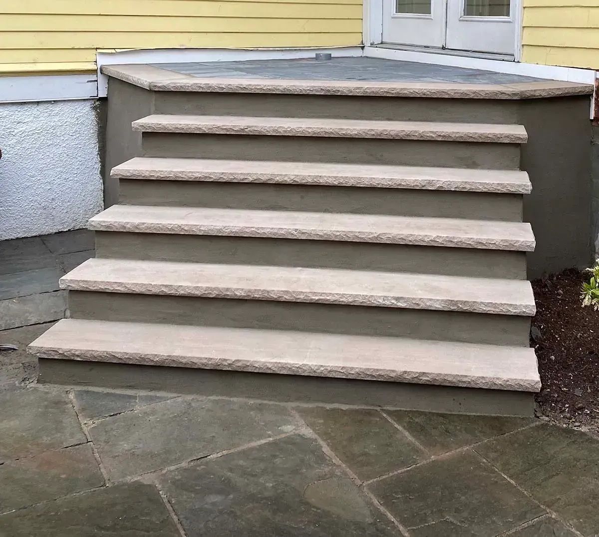Front steps leading to a house
