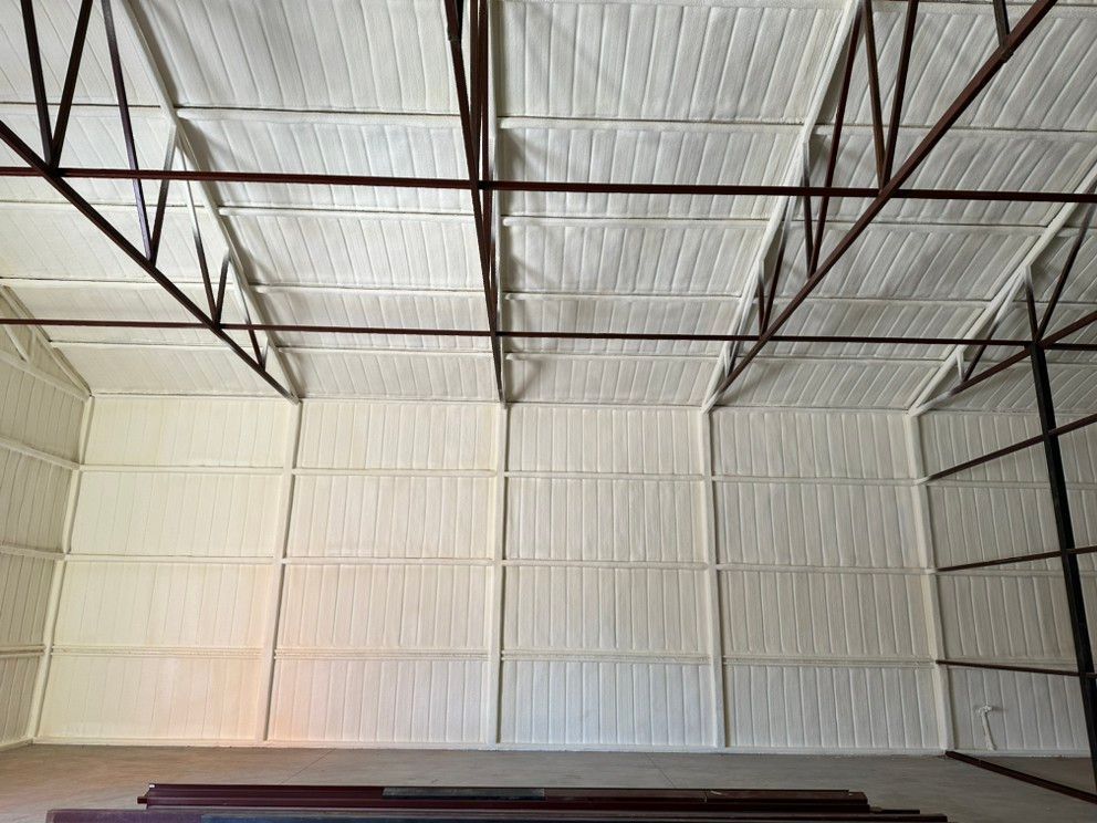 A large warehouse with a ceiling that is covered in foam.