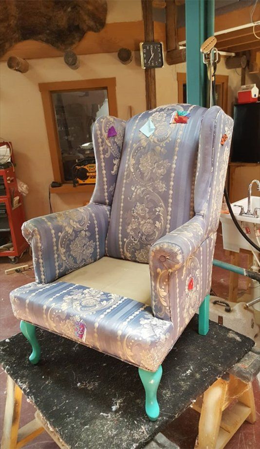 Armchair with intricate upholstery design