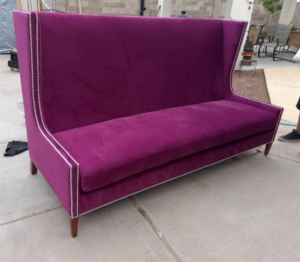 Purple velvet sofa