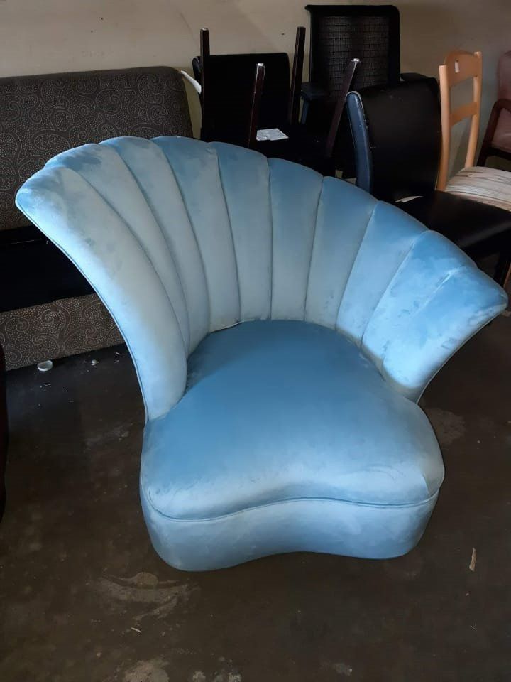 Accent chair with blue velvet upholstery