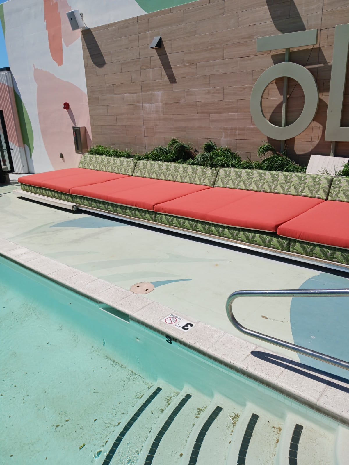 Outdoor lounge beds near a pool