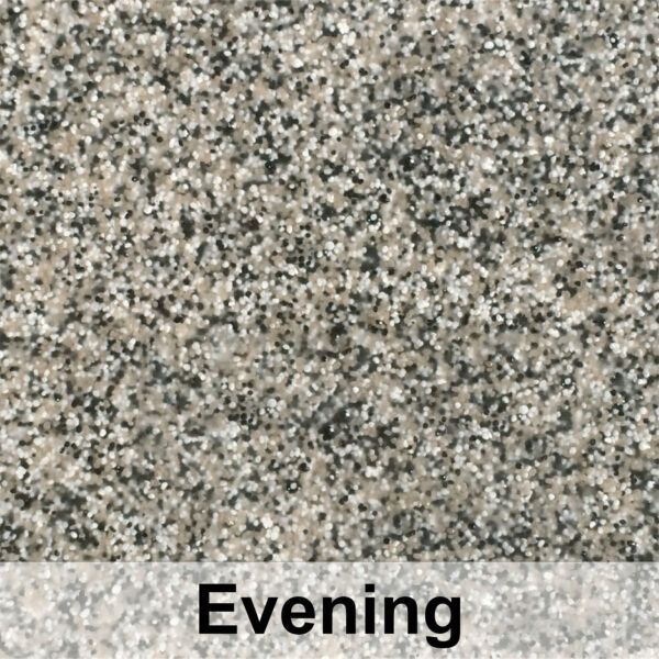 Close-up of granite surface, speckled pattern with gray, black, and tan tones. Text: 