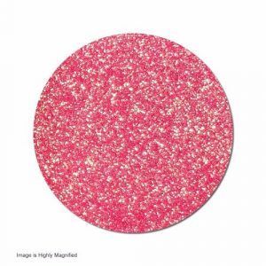 Circular pink abrasive disc with a highly magnified textured surface.