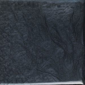 Dark, glossy square tile with swirling, smoky gray and black patterns.