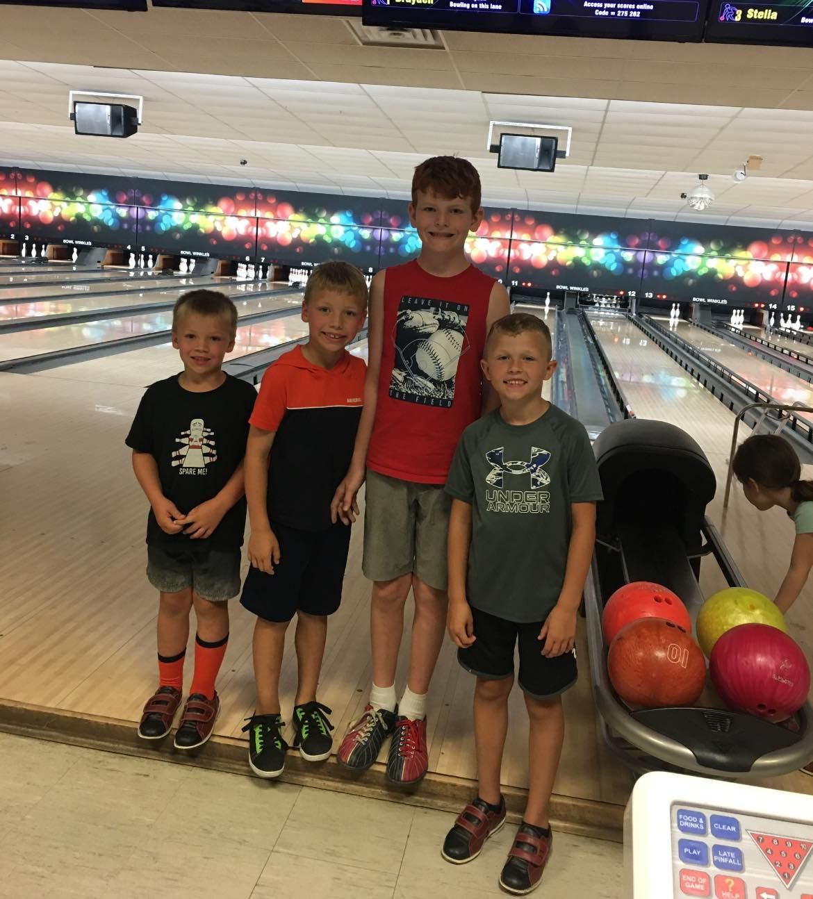 Kids playing bowling