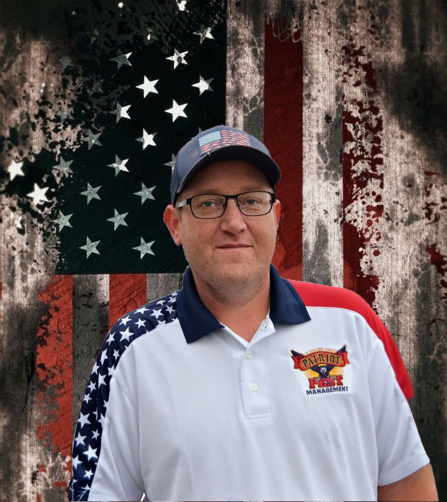 A person wears a patriotic polo and baseball cap in front of a weathered American flag backdrop.