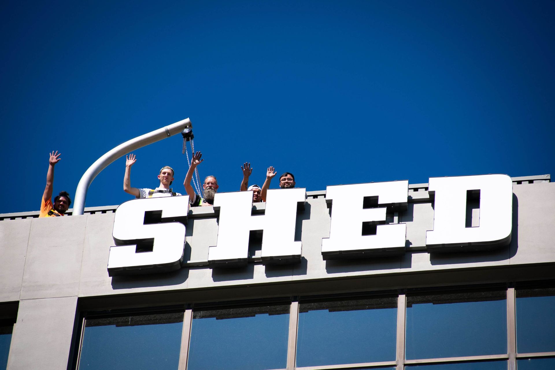 high rise mid rise installation snd service TUFF SHED project by Vision Visual Custom Sign Company high rise mid rise installation snd service TUFF SHED project by Vision Visual Custom Sign Company