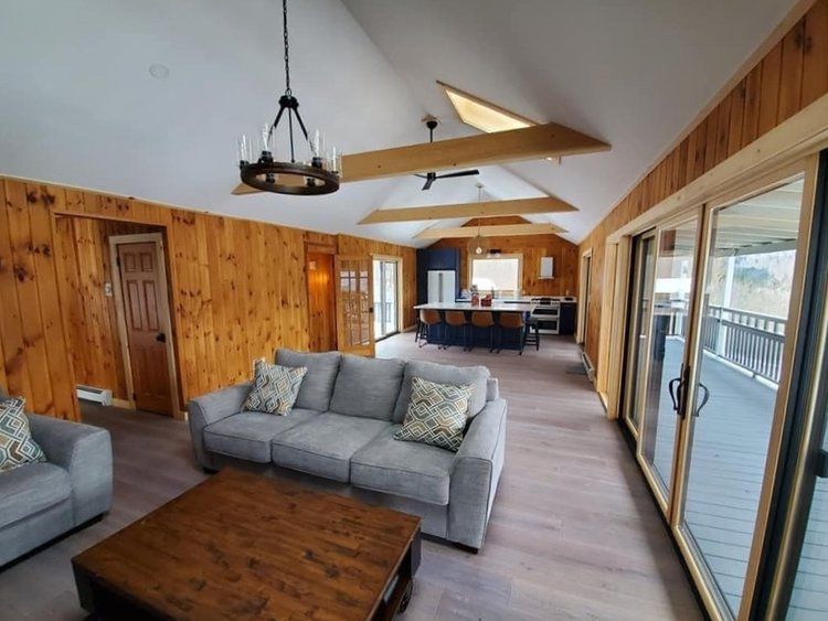A living room with a couch and a coffee table