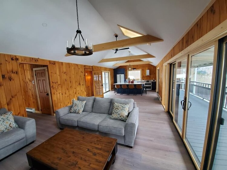 A living room with a couch and a coffee table