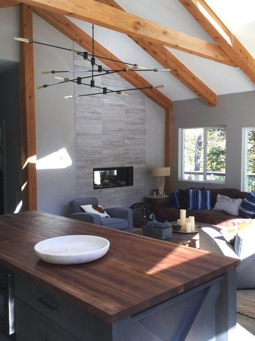 A wooden table in a living room with a bowl on it