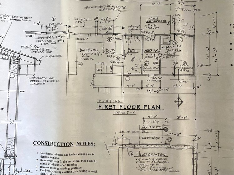 A black and white drawing of a first floor plan