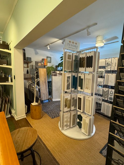 A room with a display of socks and a table