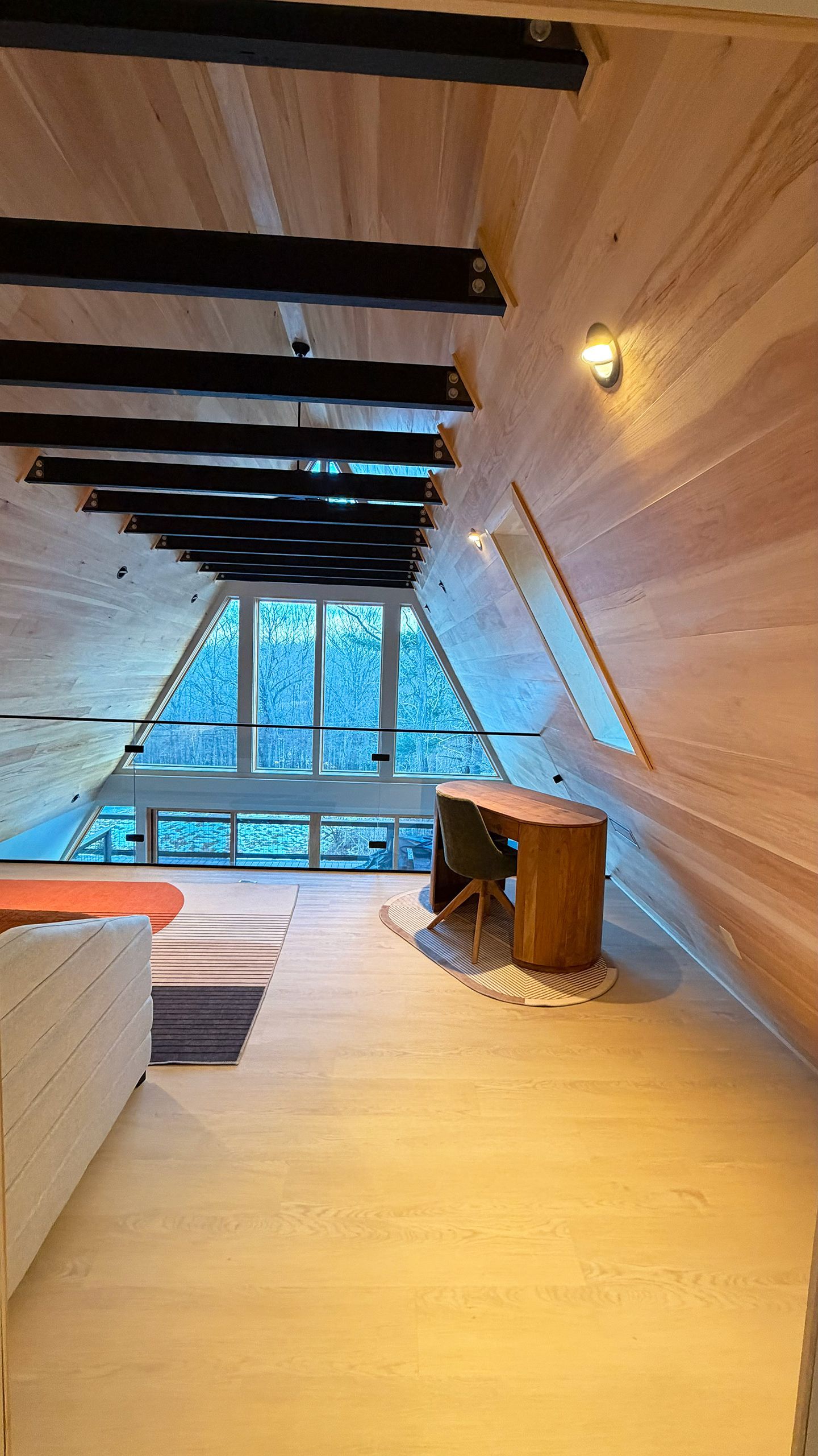 Attic office space with wood paneling