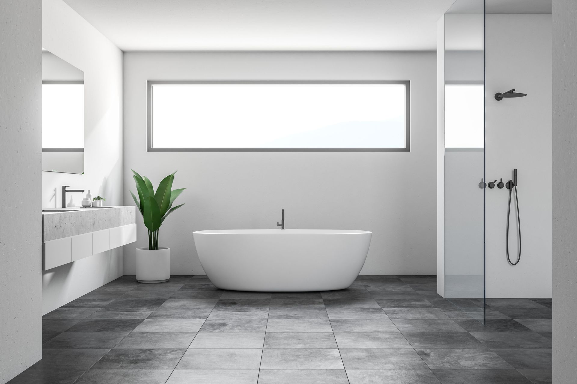 Modern white bathroom with a bathtub, plant, and glass shower. Gray tile flooring.