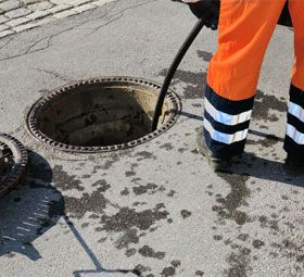 clearing drains and sewers