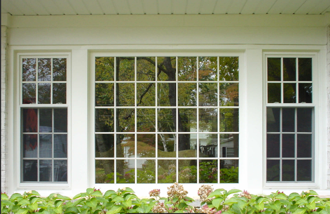 A white window with a lot of squares on it