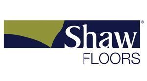 Shaw Floors logo with dark blue background, olive green shape, and white text.