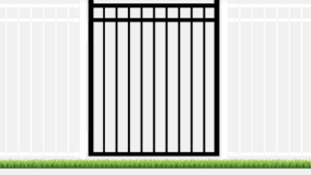 A white fence with a black gate in front of it.