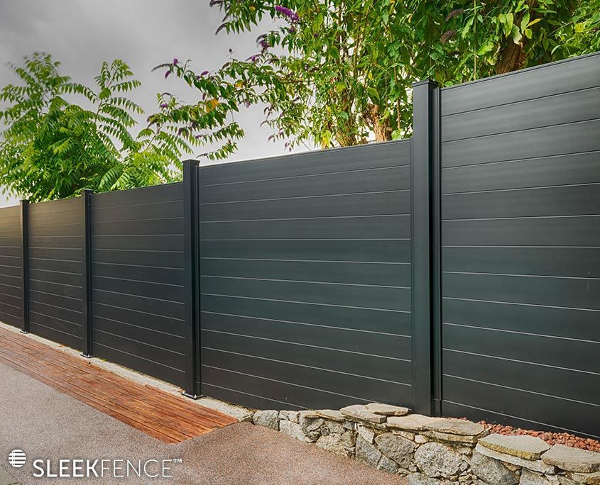 A black fence with the word sleek fence on it