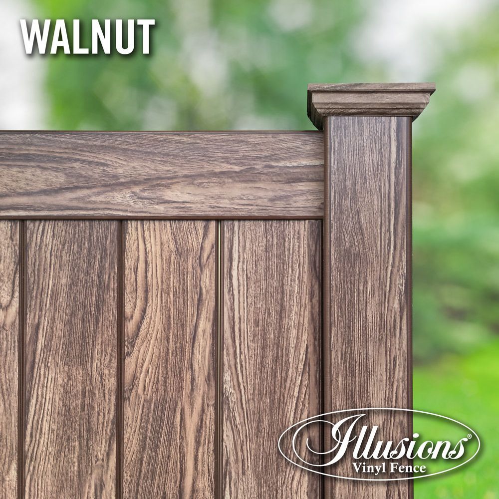 A close up of a walnut vinyl fence