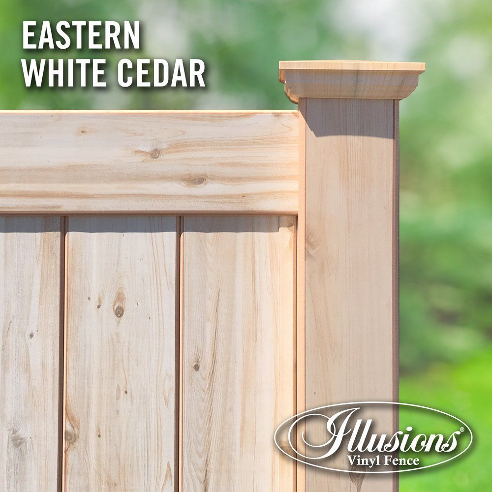 A wooden fence with the words eastern white cedar on it
