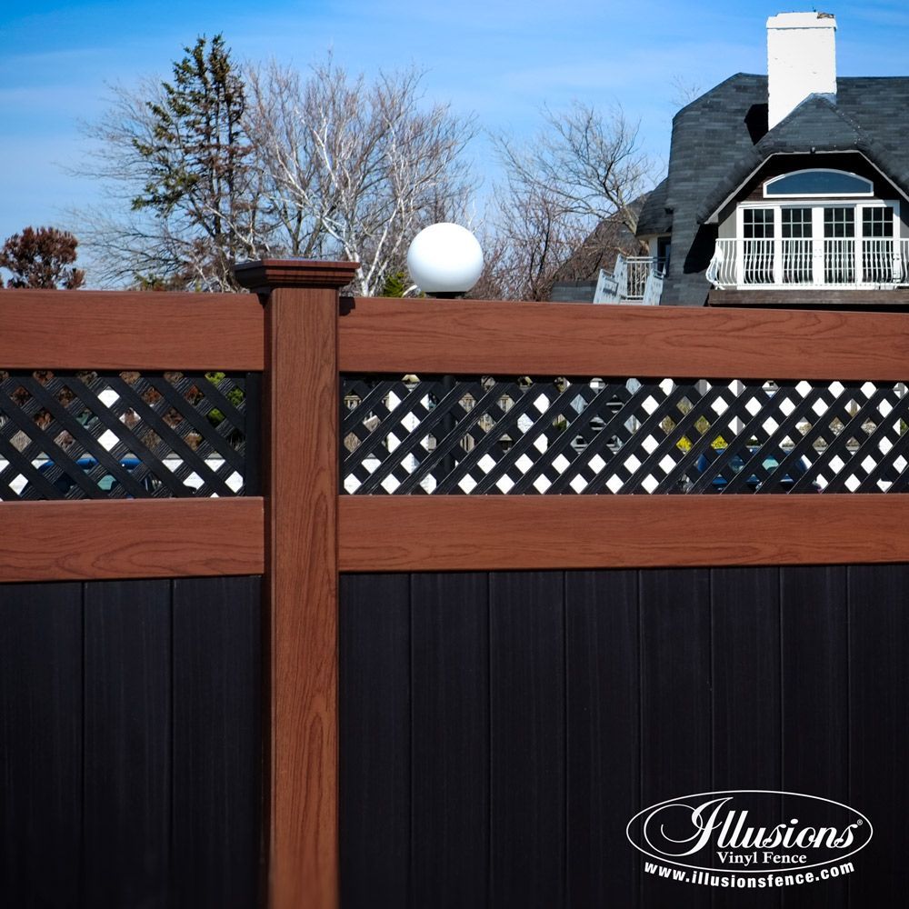 A wooden fence with illusions vinyl fence written on it