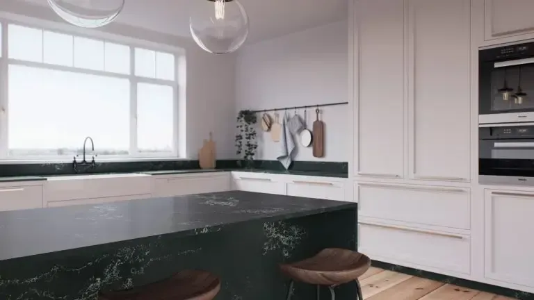 Modern kitchen with dark countertop, white cabinets, and a large window.