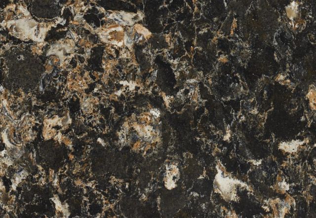 Dark countertop with brown, tan, and white veining.