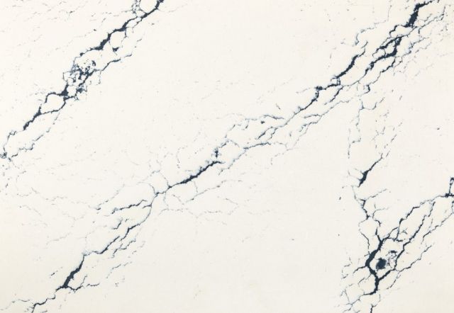 White quartz countertop with dark gray veining.