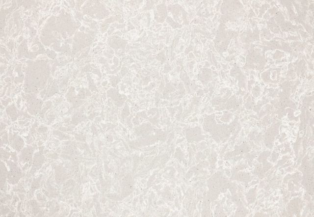 Cream-colored countertop with white veining.
